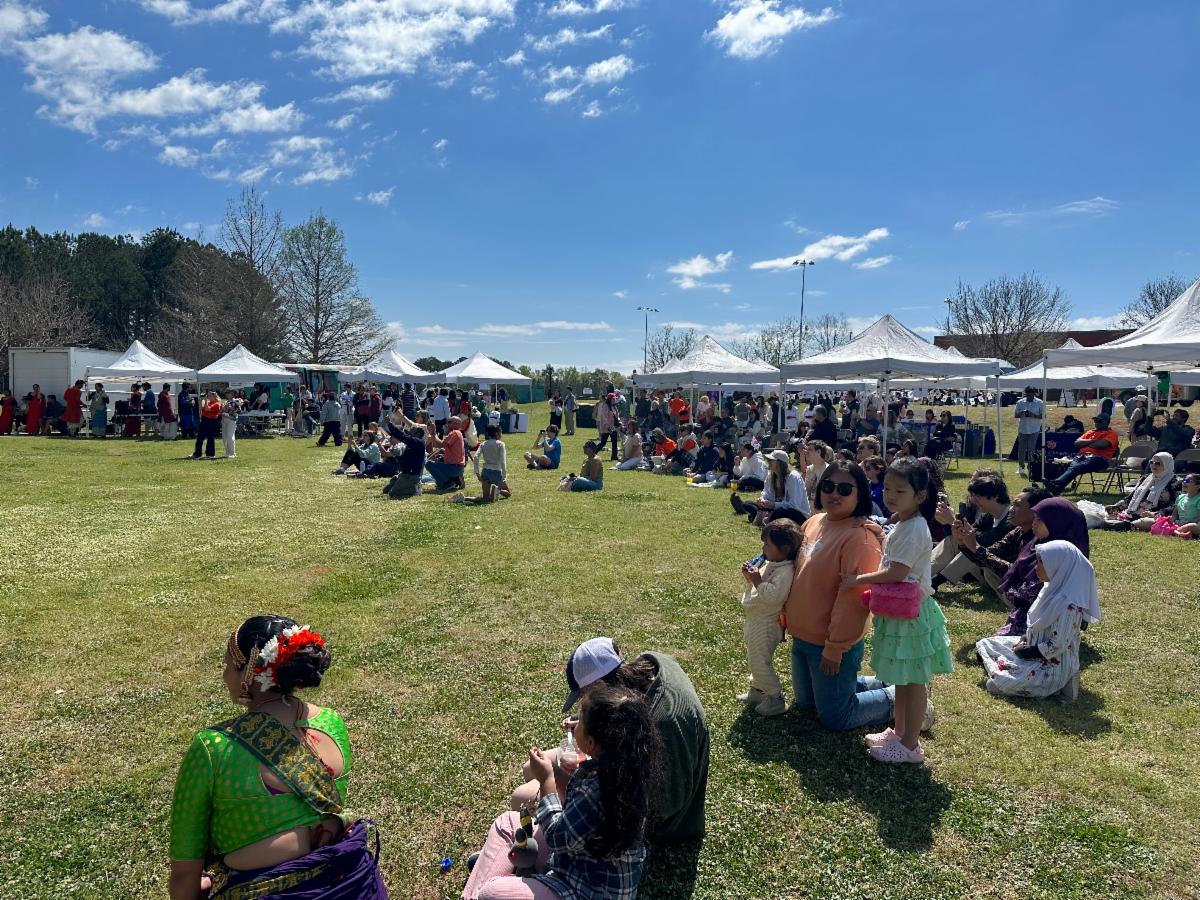 Crowd enjoying the festivities at the 5th Global Community Day Festival held at the Opelika Sportsplex.