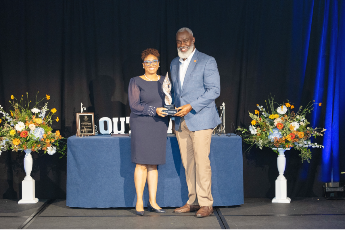 Dr. Portia Johnson receiving the Royrickers Cook Endowed Engagement Award