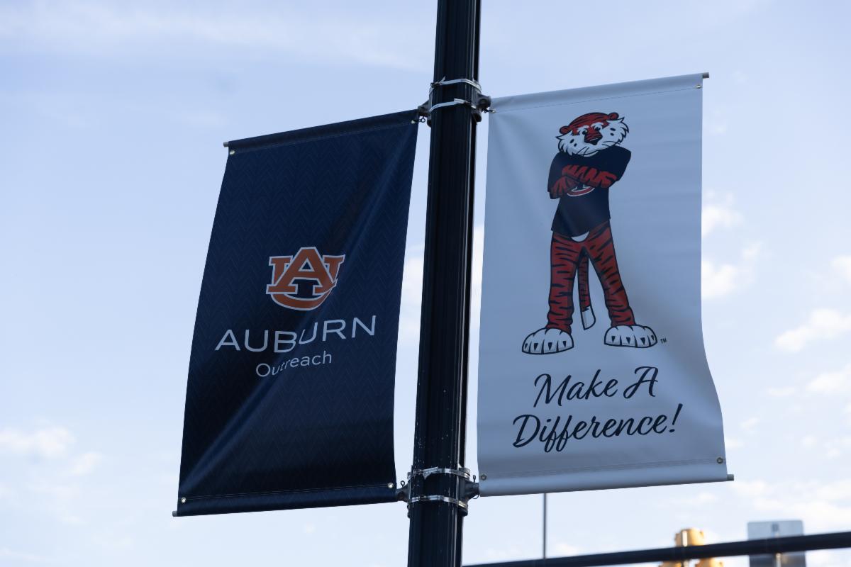 Outreach pole banner at Toomer's Corner
