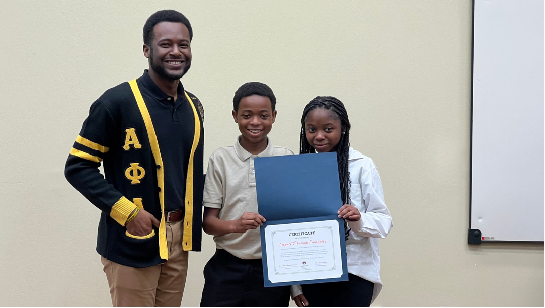 2ndPlace (from left to right): Tyler Sims & Zoie Sims; pictured with mentor and AmeriCorp VISTA for CEOE