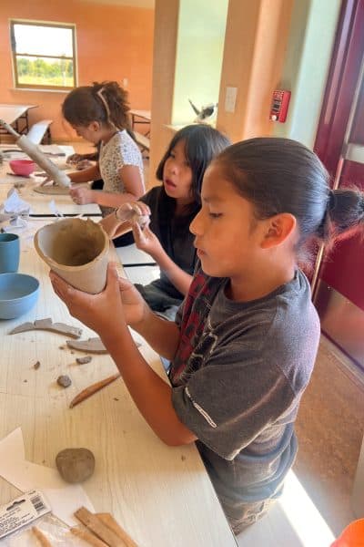 students-sculpting-clay-2024-vertical-alt-400x600.jpg