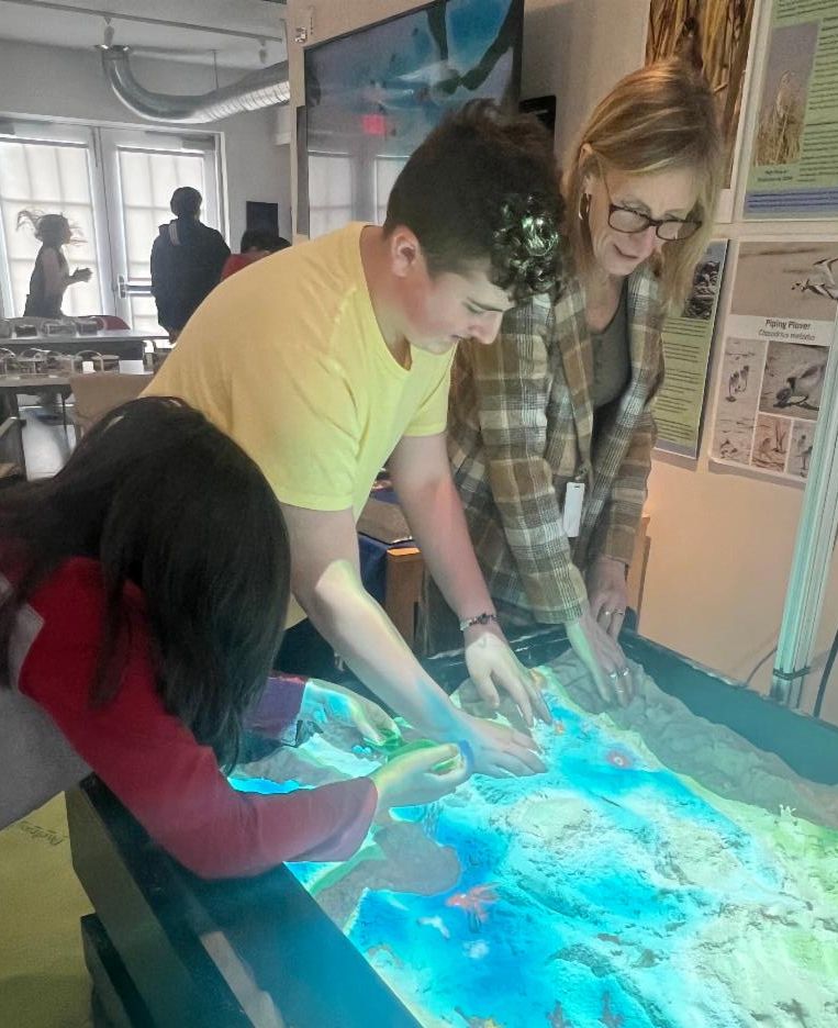 River Center Sand Table with students
