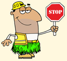 Flagman in grass skirt