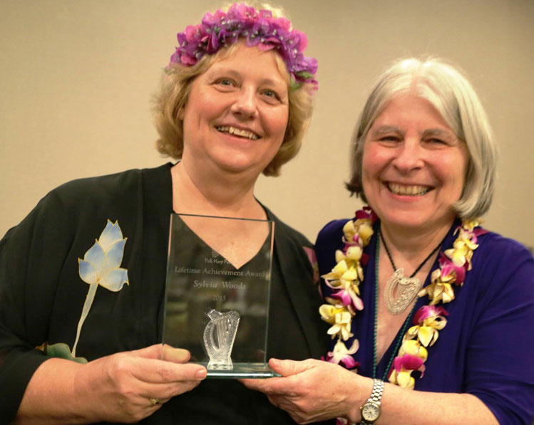 Sylvia and Kathy and award