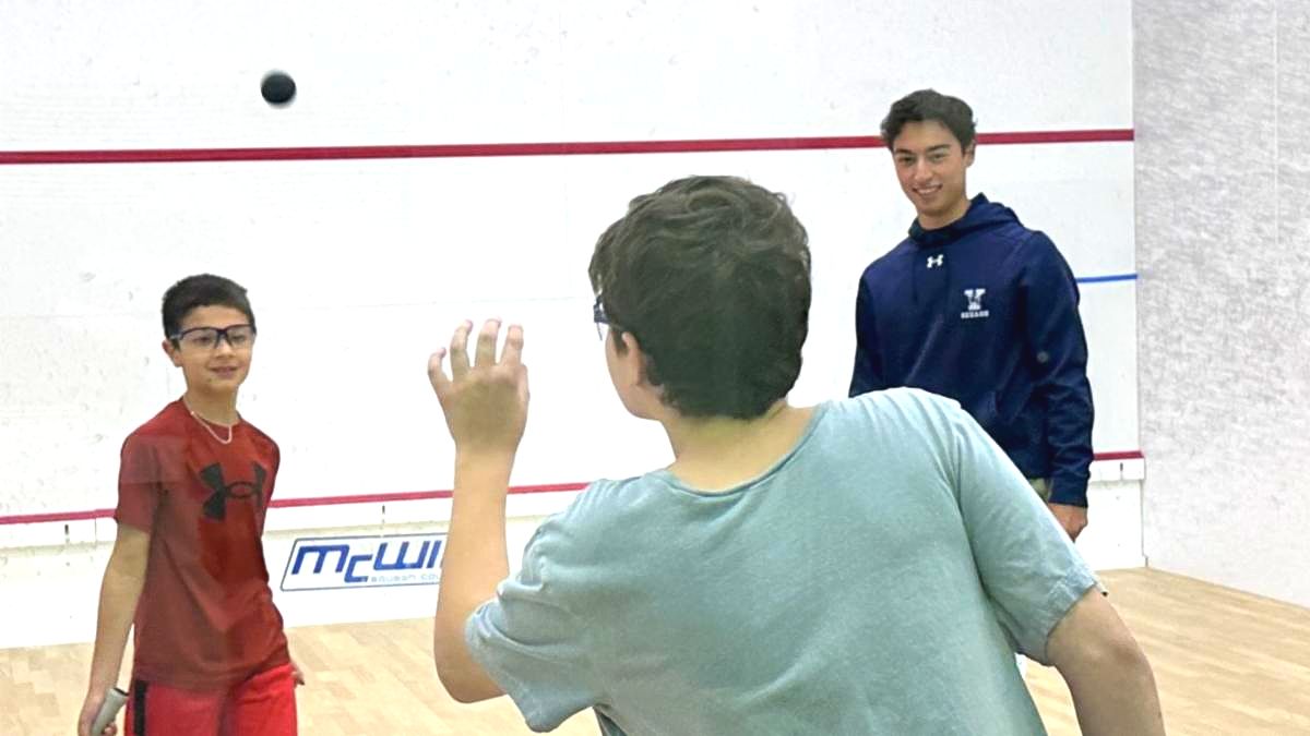 Fall 2026 Open House - Pro on court with juniors