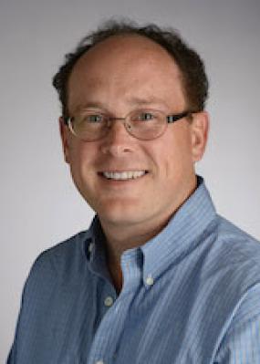 Headshot of Evan Dean