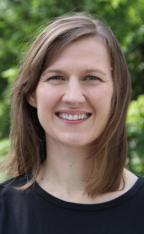 Renata Opoczynski smiling on a sunny day