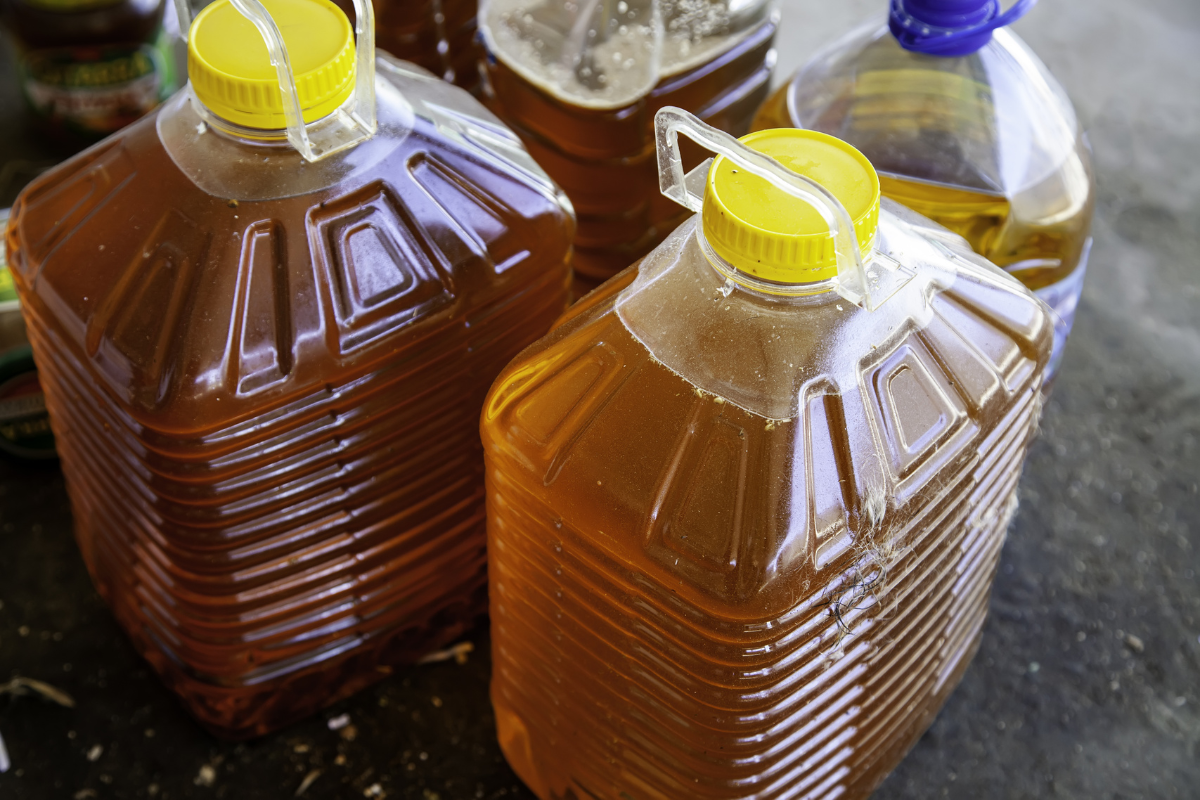 Stock photo of used cooking oil being stored
