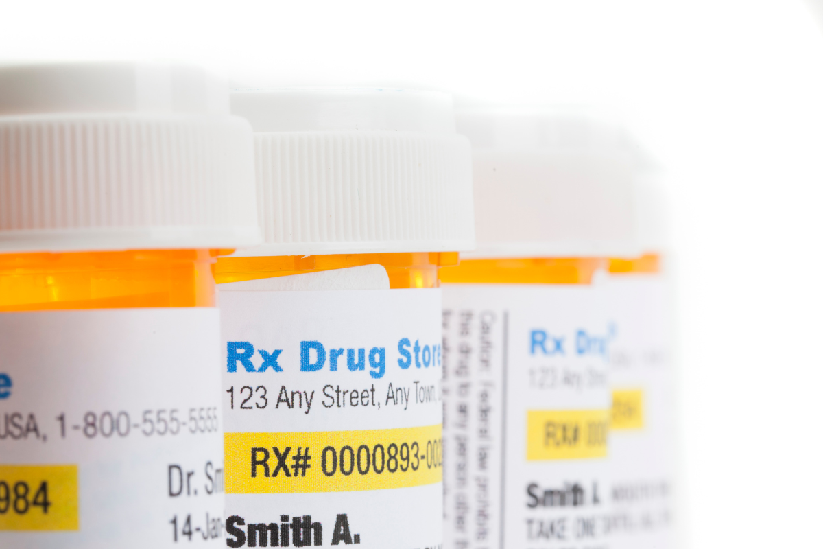 Stock photo of three prescription drug bottles