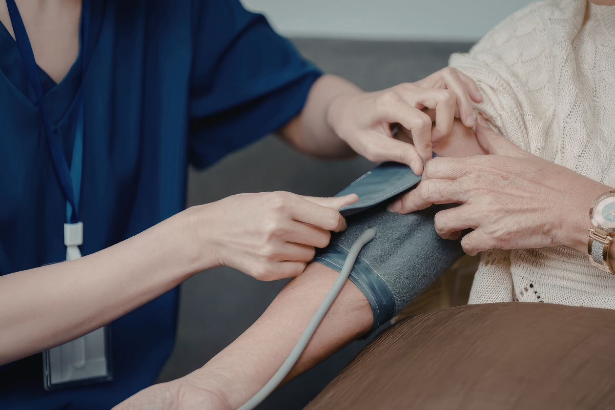 Photo of a senior getting a blood pressure check