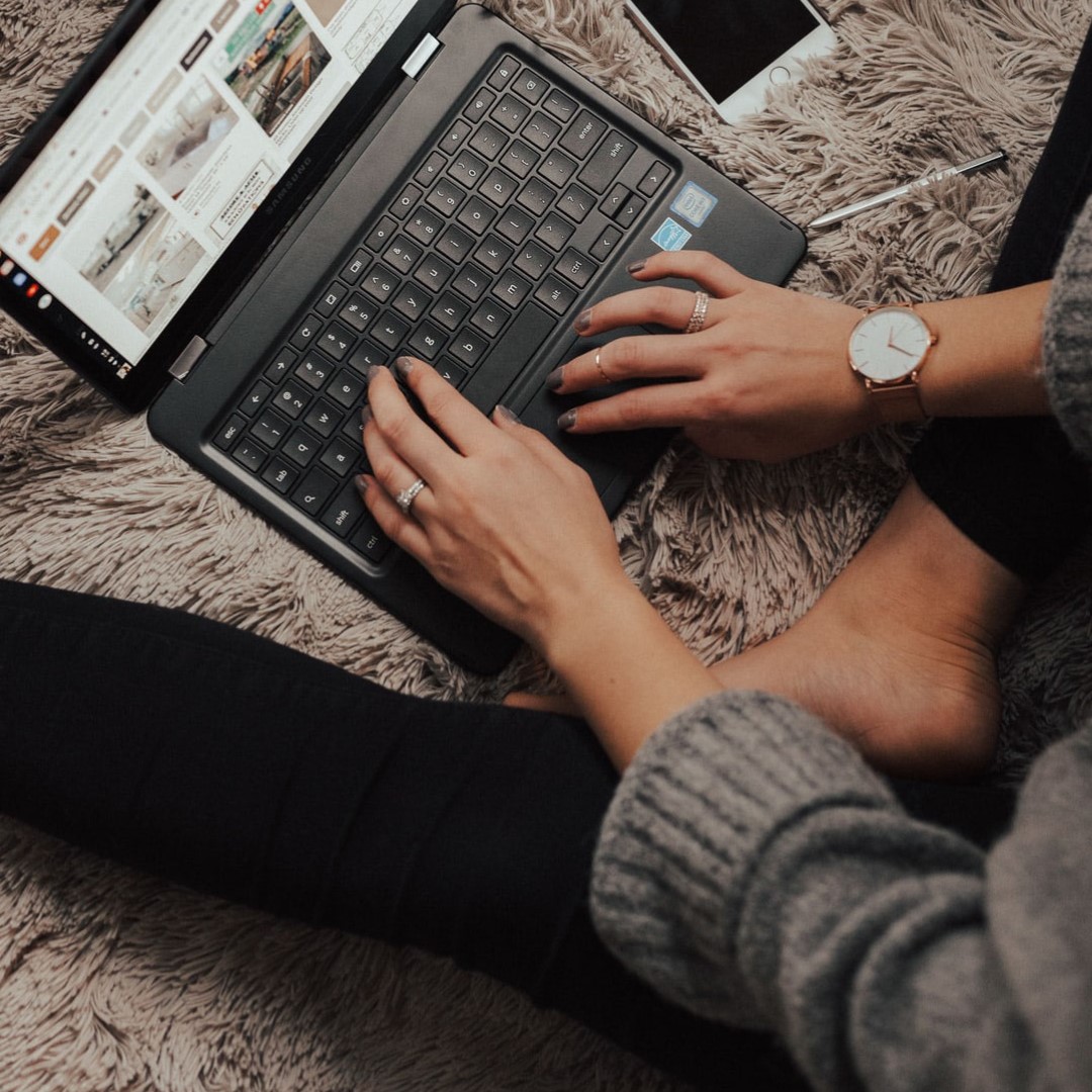 typing on laptop