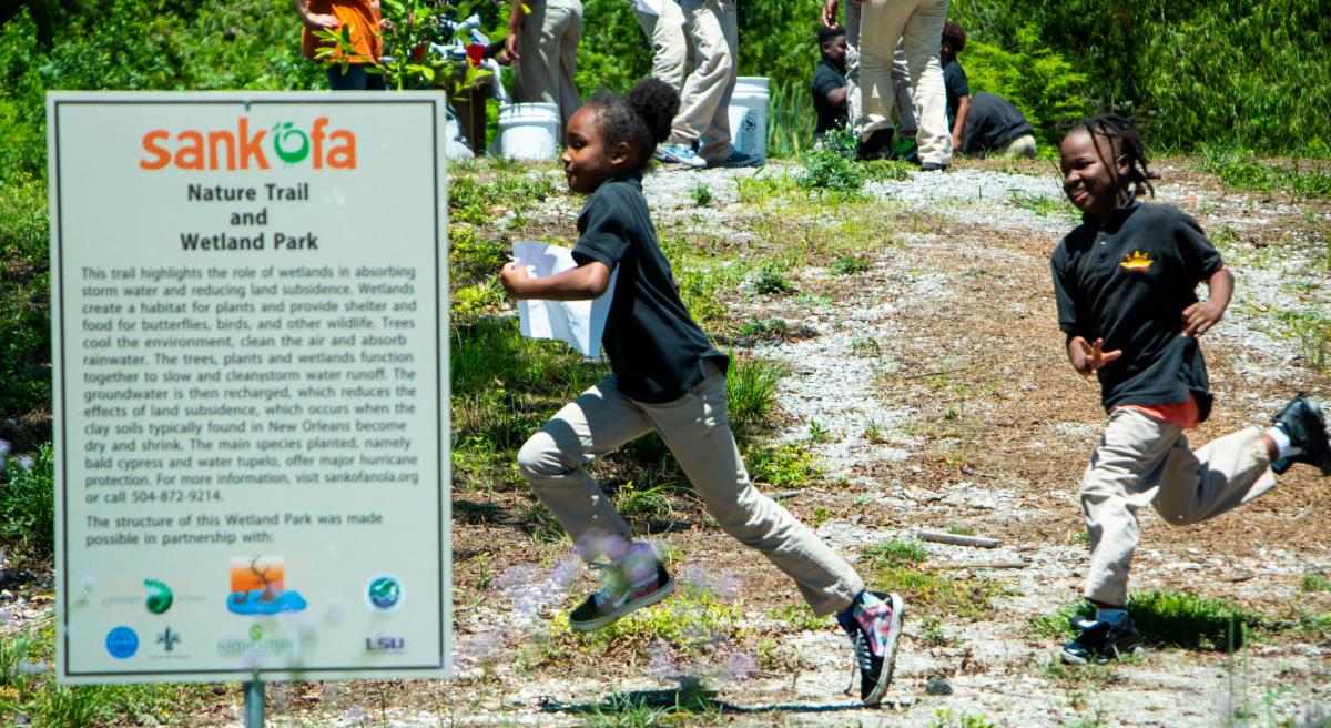 kids playing park sign.jpeg