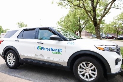 White SUV with Pierce Transit logo on the side