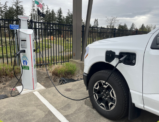 picture of an EV truck plugged in