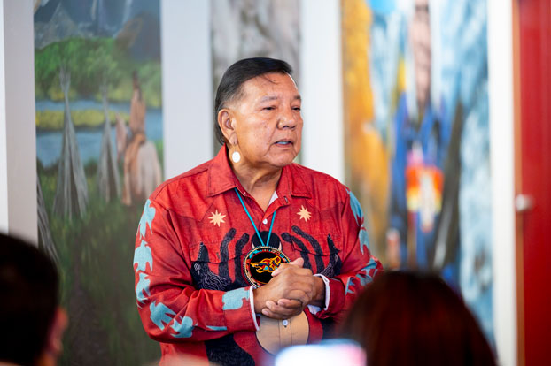 Ute storyteller Larry Cesspooch speaks at CMC Rifle