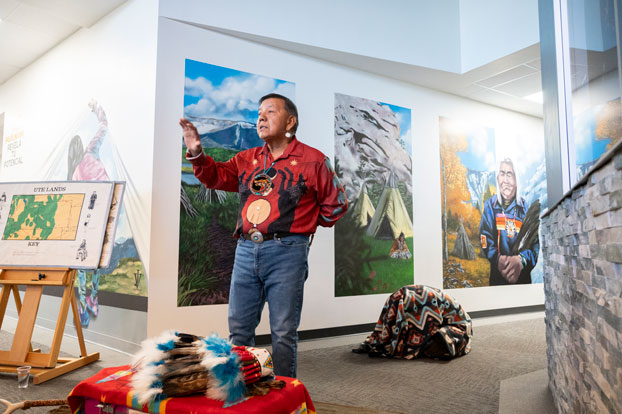 Ute storyteller Larry Cesspooch speaks at CMC Rifle