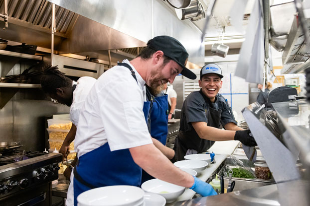 Student chefs prepare the first course