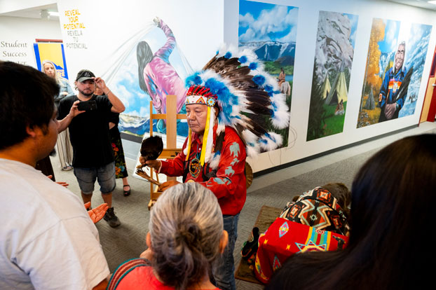 Ute storyteller Larry Cesspooch speaks at CMC Rifle
