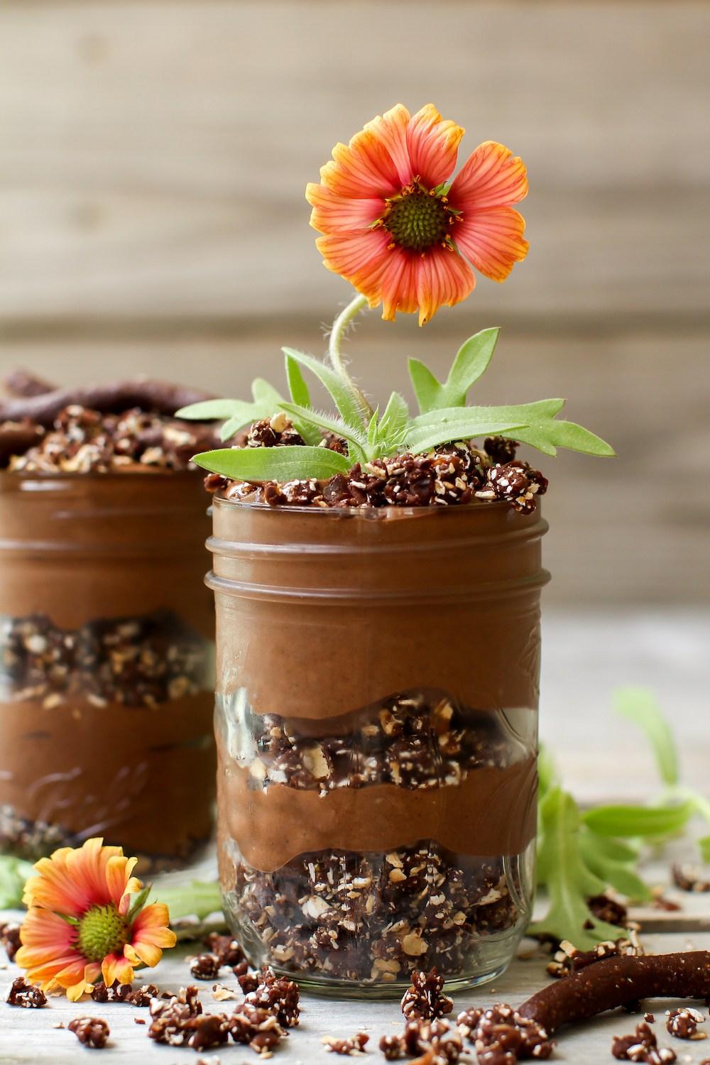 chia pudding cup in mason jar with orange flower decoration