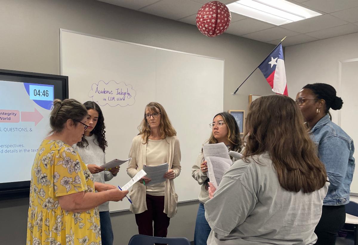 photo of six teachers in a discussion protocol from DoK training