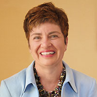 kelly-broker-photo-new-cropped.jpg