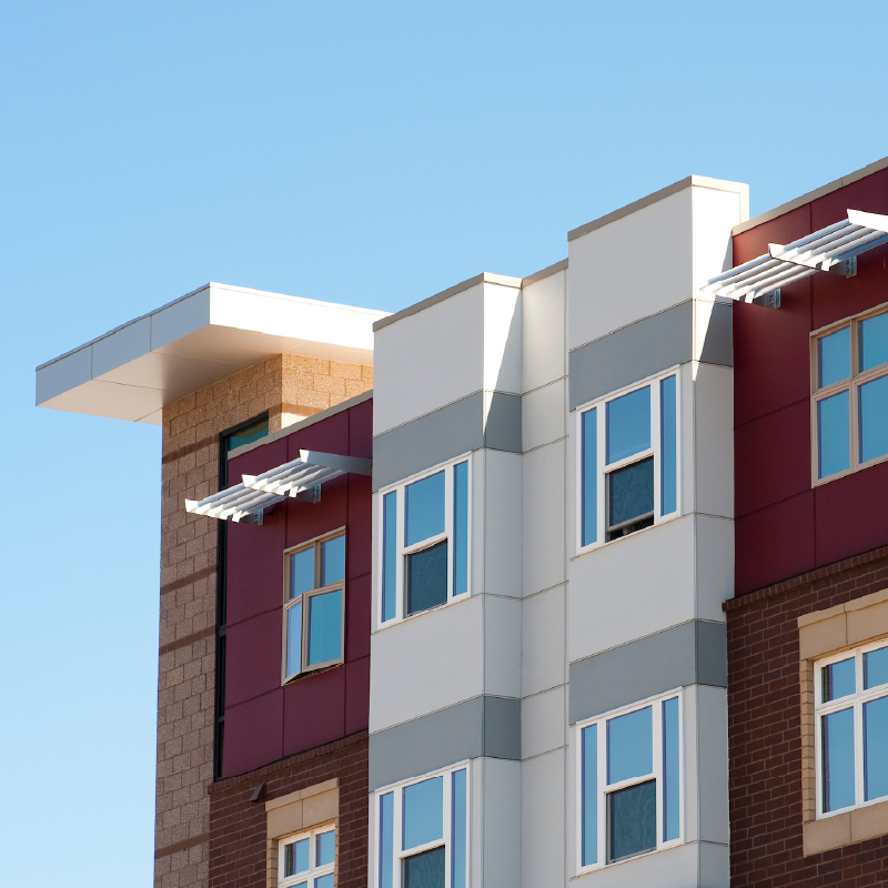 The exterior of a modern multifamily building