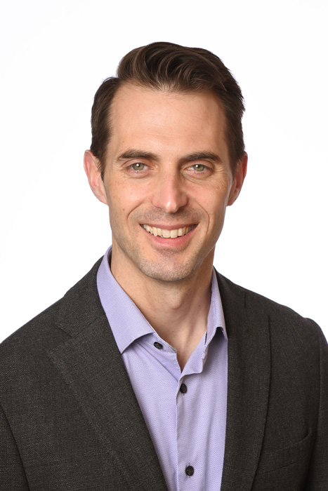 headshot photo of Dr. Jason Baker