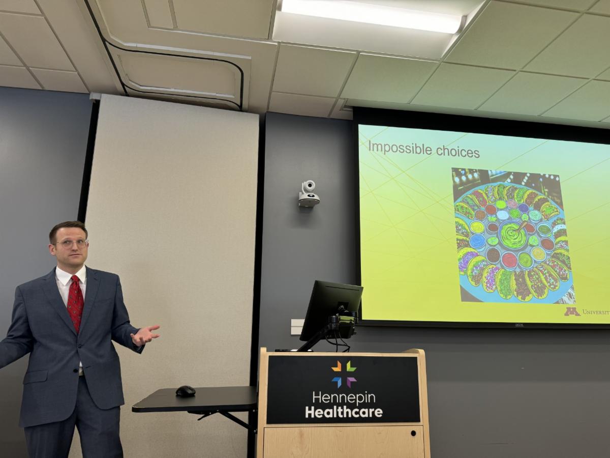 Dr. David Darrow presentation with a slide about "impossible choices" in regards to TBI
