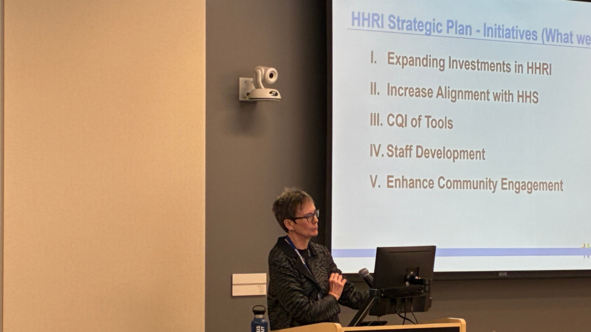 Dr. Kirsten Johansen speaking at the 2026 HHRI Research Symposium