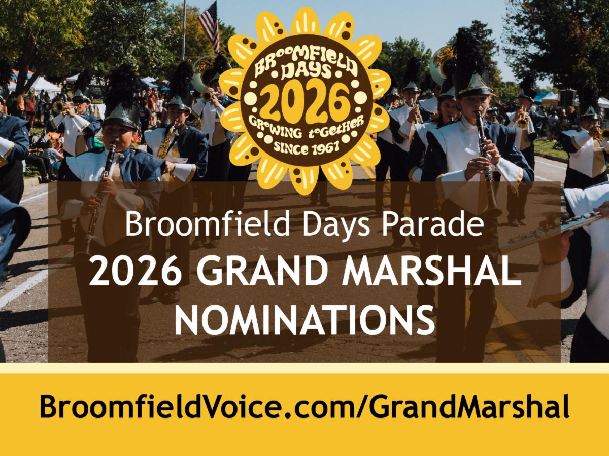 A marching band in blue and white uniforms is depicted in the background of a sunny parade scene. Overlaying the image in white and brown text is: 'Broomfield Days Parade 2026 GRAND MARSHAL NOMINATIONS'. Below the main text, in large brown text, is the website 'BroomfieldVoice.com/GrandMarshal'. At the top, there is a circular logo featuring a sunflower with the text 'BROOMFIELD DAYS 2026 GROWING TOGETHER SINCE 1961'."