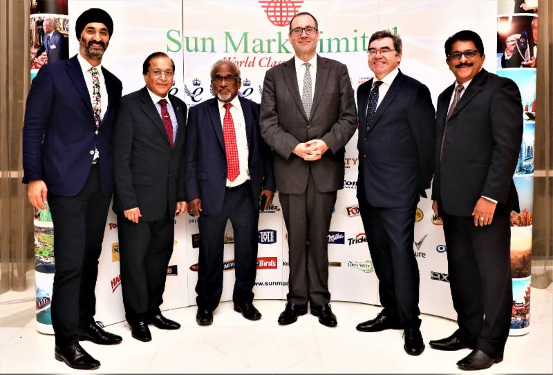 GOPIO and Sunmark officials with dignitaries in Dubai