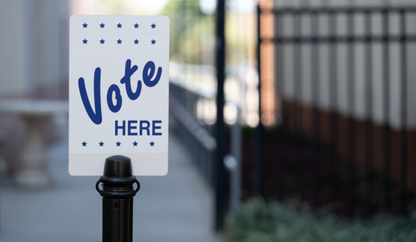 Image of Vote Here sign