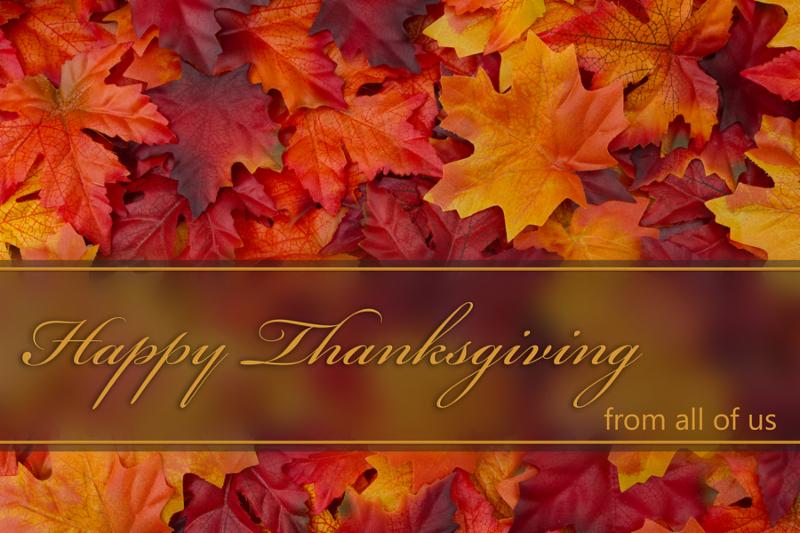 Happy Thanksgiving Greeting Fall Leaves Background and text Happy Thanksgiving from all of us