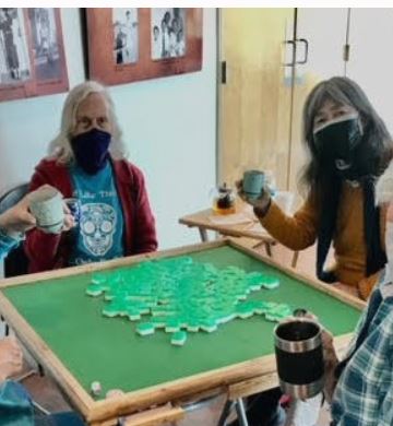 Sarah and Carolyn play Mah Jong