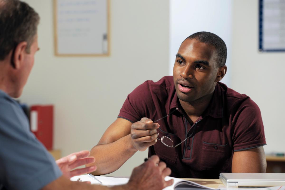 male in interview