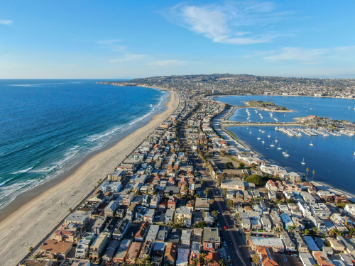 Aerial view of Mission Bay   Beaches in San Diego_ California. USA. Community built on a sandbar with villas_ sea port.    recreational Mission Bay Park. Californian beach-lifestyle.