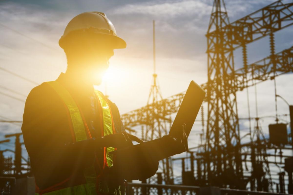 Person working in clean energy using a laptop