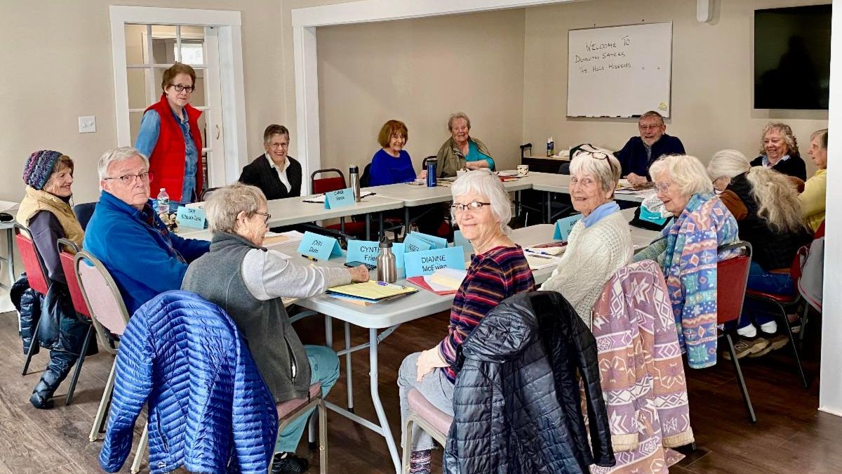 The Midcoast board members gather in the new meeting room.