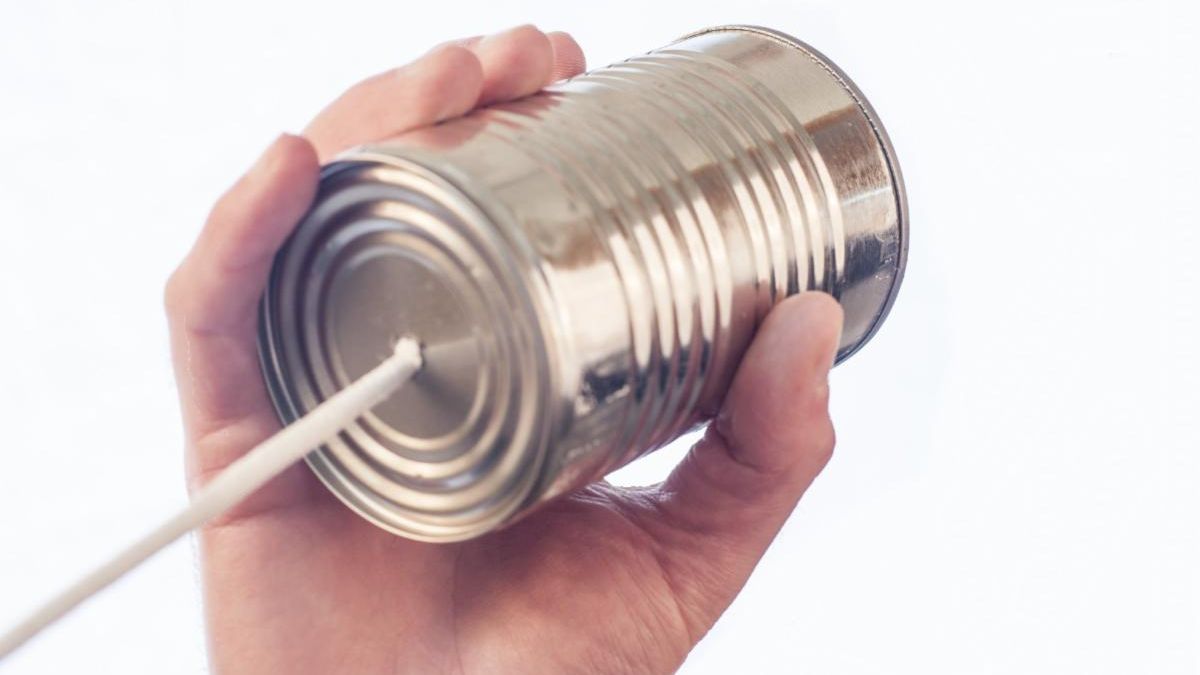 A tin can with a string out the bottom to create a telephone.