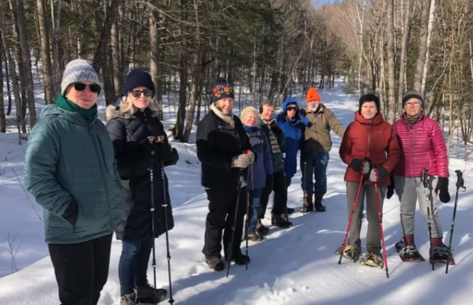Members of the GoldLEAF Institute snowshoe