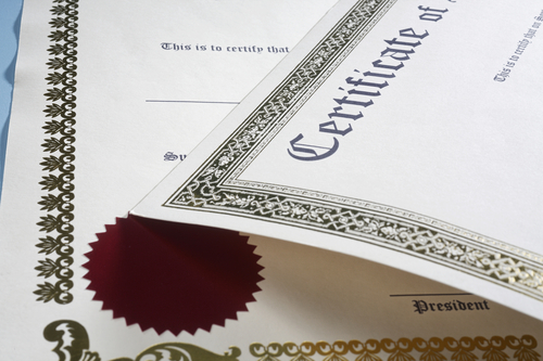 Certificate on the blue table.