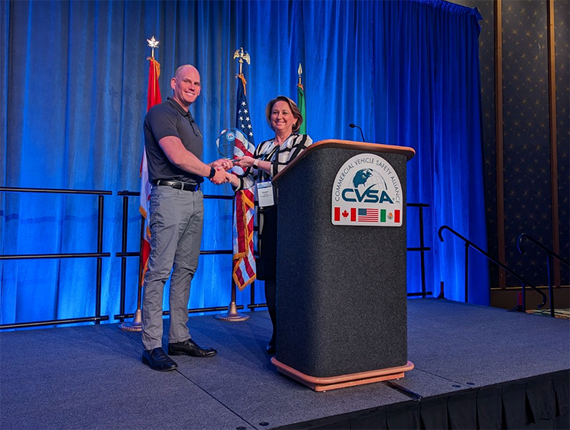 Enforcement Efficiency Award given to the State of Michigan for calendar year 2022 presented by UCR Board Chair Elizabeth Leaman to the Sergeant Jack Johnson, Michigan State Police.