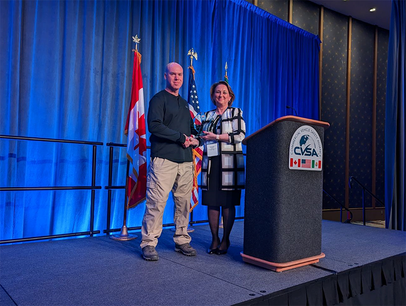 Enforcement Efficiency Award given to the State of Illinois for calendar year 2022 presented by UCR Board Chair Elizabeth Leaman to the Commander Ryan Nance, Illinois Commerce Commission Police.