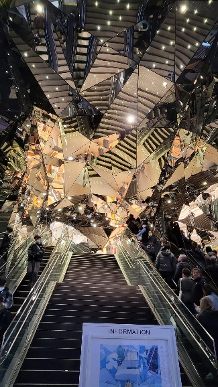Traveling through Tokyo, these are pictures of various Pokémon including a graffiti of Mewtwo on the wall, and me hugging Snorlax, posing with my friend Erin in front of Temple torii gates and take a picture of the mirrored entrance to a fashion mall. 
