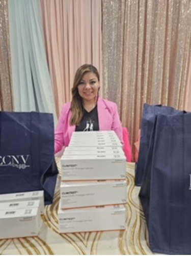 ECNV volunteer Volunteer Jimena Barron helping to distribute COVID-19 tests.