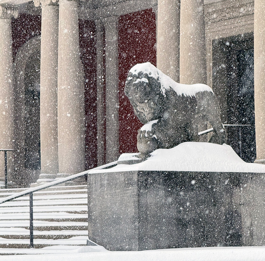 A snowy exterior of a museum building