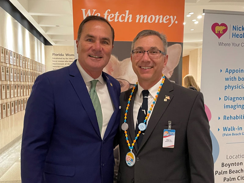 Representative Mike Caruso with Solid Waste Authority of Palm Beach County Willie Puz.