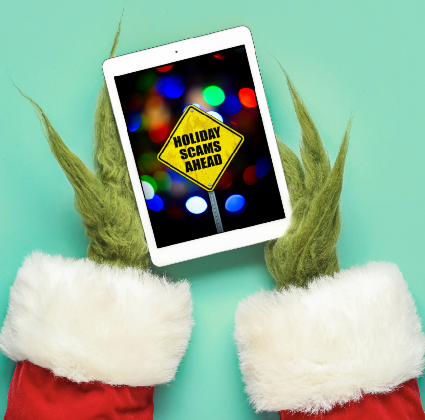 Grinch hands holding an iPad that says Holiday Scams Ahead