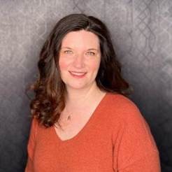A headshot of Kelly Zarka