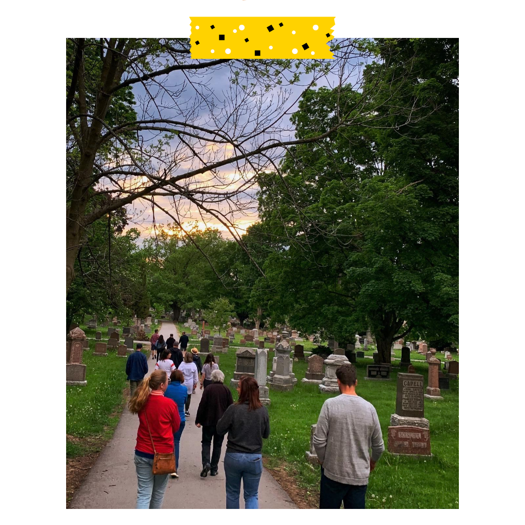 People walking on a trail in a group.